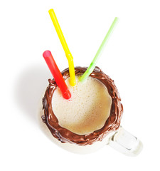 Banana milkshake in a glass jar (mason jar) with donut, isolated on white background.