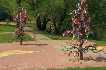 Decorative wedding locks on forged iron trees