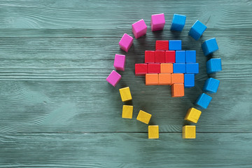 Human brain is made of multi-colored wooden blocks. Creative business concept.