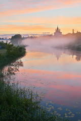 Suzdal town landscape. It is a gem of the Golden Ring of Russia route, famous tourist destination. View to the Alexandrovsky convent from the Kamenka river bank.