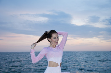 hairdresser salon. hairdresser concept with happy woman show brunette curly hair at sunset beach.