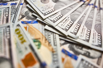 Background of 100 dollar bills. Money american hundred dollar bills.