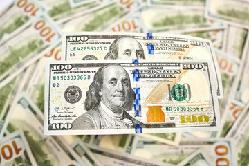 Background of 100 dollar bills. Money american hundred dollar bills.
