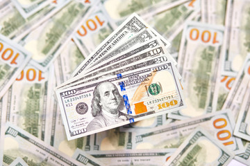 Background of 100 dollar bills. Money american hundred dollar bills.
