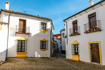 Fototapeta premium Architectural details, typical street in historic district of Ronda, Spain