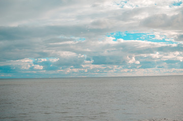 Fototapeta premium Beautiful cliffs and sea coastline outdoors natural background Portugal Europe. Recreational tourism inspirational scenery photograph