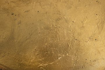 Gold surface of the table.