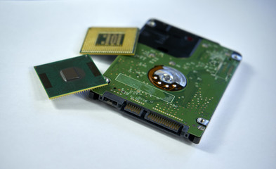 2,5 inch laptop sata hard drive with two CPU laptop processors isolated on white background with...