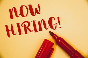 Handwriting text Now Hiring Motivational Call. Concept meaning Workforce Wanted Employees RecruitmentIdeas messages words red letters created on vintage background open pen.