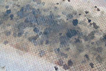 Oil drips grunge Industrial Checker Plate Background Texture with Rusty Worn Embossed Raised...
