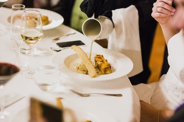 View from above of a table during the dinner of an event or wedding