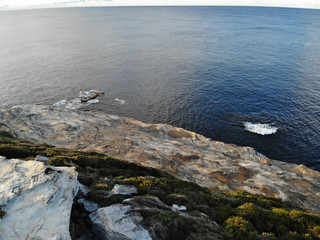 Top view shot of cliff near water