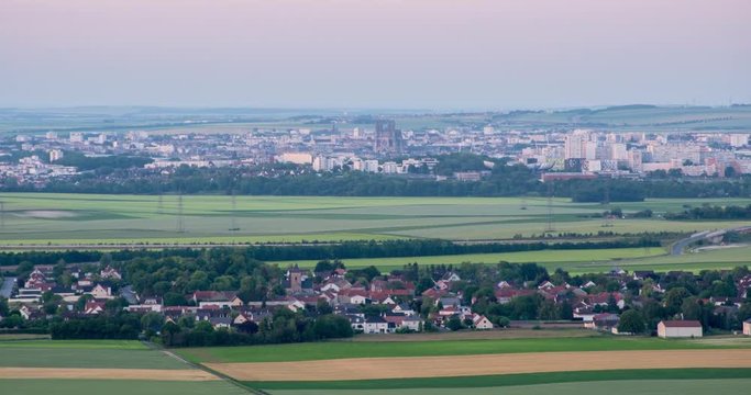 From dat to night time-laps of Reims city in summer from Ville Dommange, Champagne-Ardennes, France