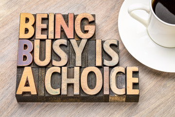 being busy is a choice - word abstract in wood type