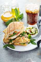 Grilled panini sandwich with chicken and cheese