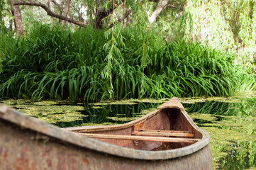 wooden canoe on water