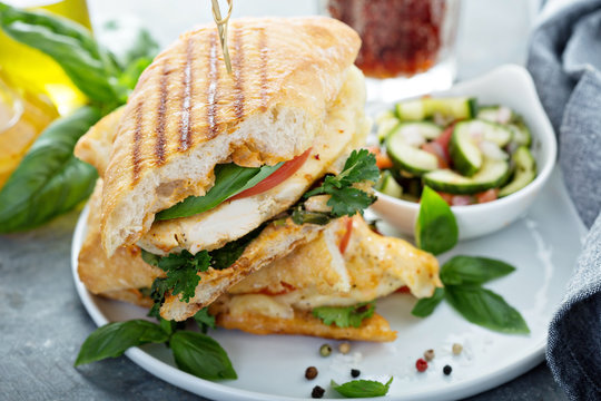 Grilled panini sandwich with chicken and cheese