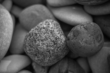 boulders and colorful pebbles on the beach
