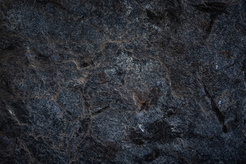 Dark stones texture pattern nature background.