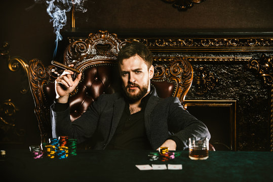 wealthy man playing poker
