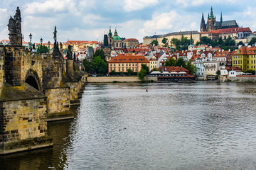 Obraz premium Charles Bridge and Cathedral in Prague, Czech Republic