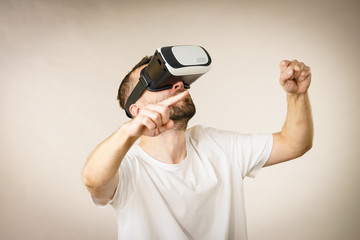 Adult man wearing vr goggles