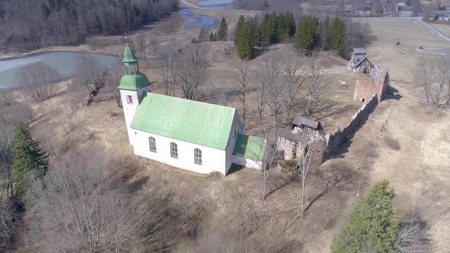 2802_Aerial_view_of_the_green_roof_chapel_in_Karski_Estonia.mp4