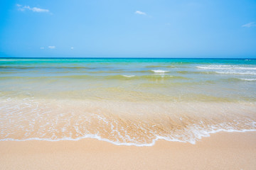 Fototapeta na wymiar Sand beach and wave background
