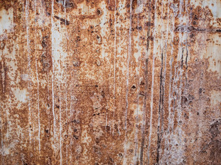 rusty painted metal with drips