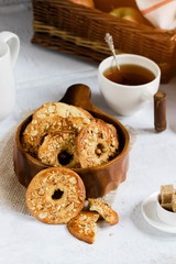 Homemade peanut cookies in a wooden bowl. Tea time in a rustic style.