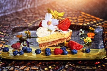 cake with creme and fruits in restaurant