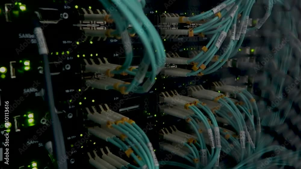 Aufkleber fiber optical connector interface. flashing lights. data server. video contains noise.