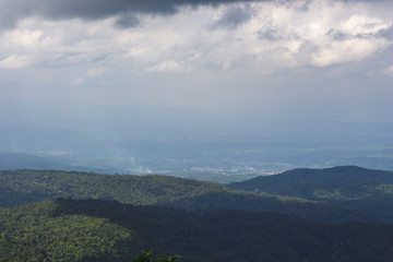 Mountain view and blue sky with beautiful white clouds.