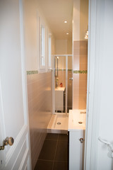 Fototapeta na wymiar very small bathroom as wide as a hallway