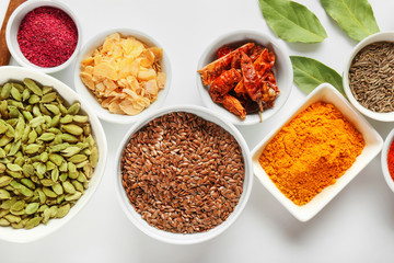 Variety of spices on white background