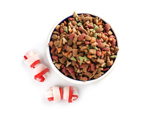 Pet food in bowl on white background