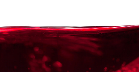 Red wine on white background