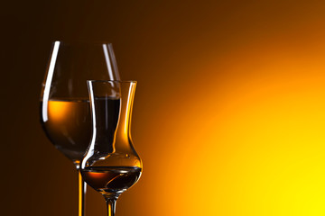 Closeup of glasses with white wine ,free space for your text