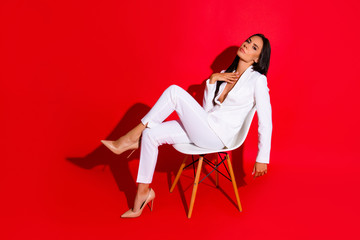 Chill out studio concept. Full size portrait of hot naughty girl with perfect figure sitting on...