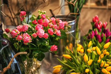 Beautiful pink roses in flower shop