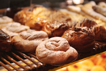 Tasty bakery on shelf in shop