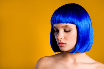 Portrait with copyspace empty place for product of pop exotic girl in blue wig having natural make...
