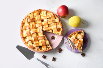 Composition with delicious apple pie on light background
