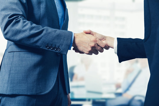 Business People Meeting And Handshake In Conference Room