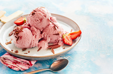 Tasty strawberry ice-cream sundae in a parlour
