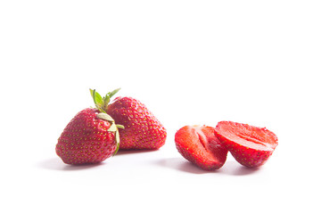 Strawberry fresh ripe sweet berry with sliced half isolated on white.