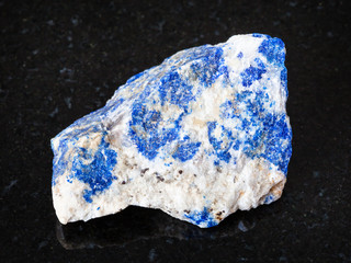 raw Lazurite (Lapis Lazuli) stone on black
