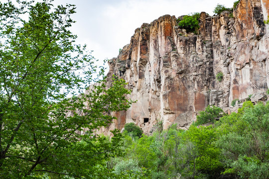 rocky wall of gorge of Ihlara Valley in Cappadocia