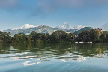 Foto op Plexiglas The Machapuchare and Annapurna range seen from Phewa Lake in Pokhara, Nepal  © Thomas Dutour