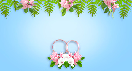 Magnolia flowers and bridal rings for wedding with place for your text